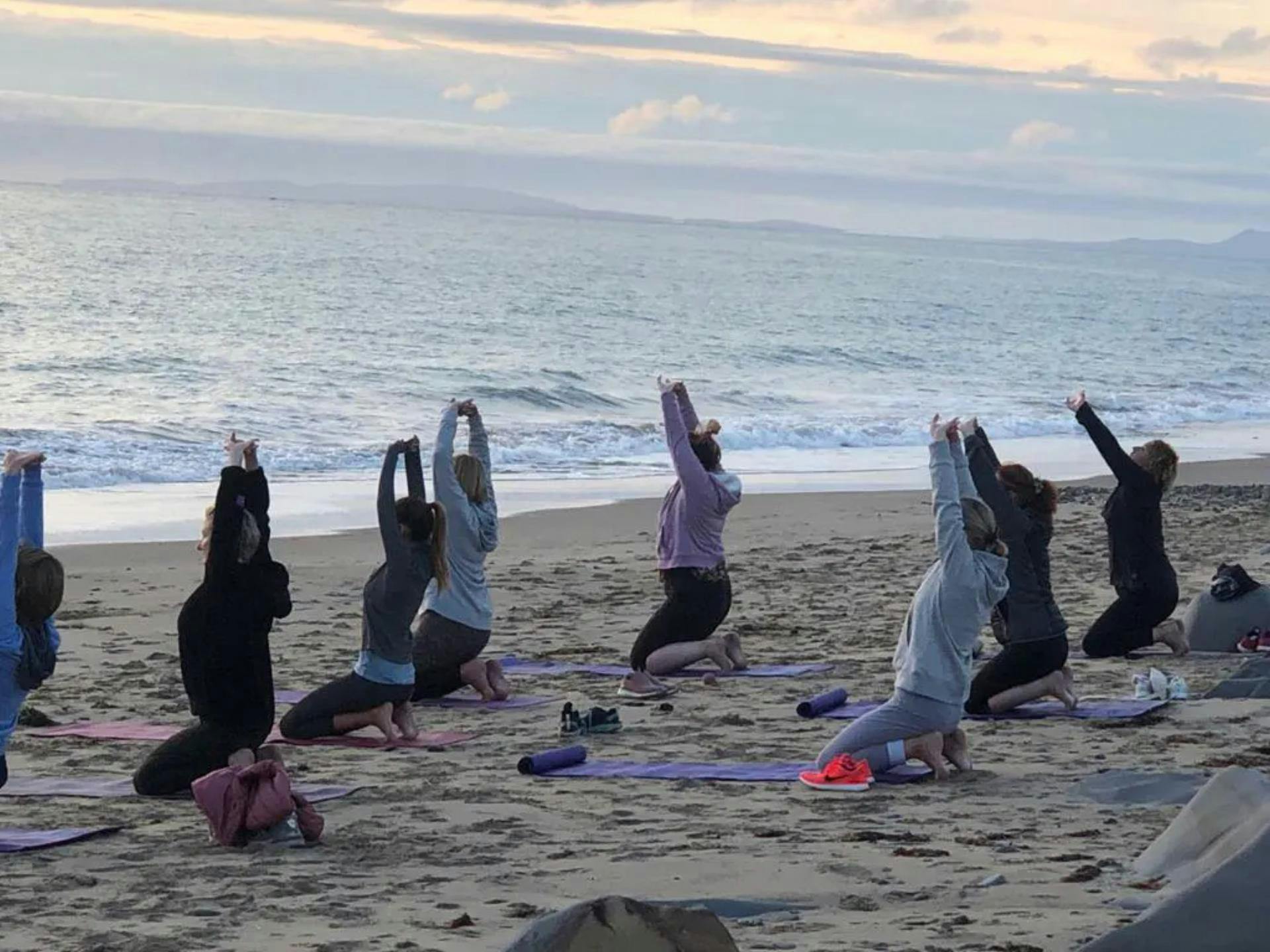 yoga on the beach in tywyn